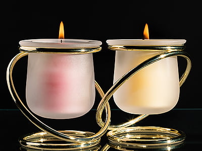 two lighted brass-colored handle candle holder thumbnail