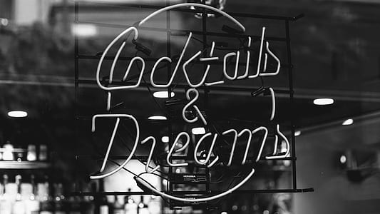 grayscale photo of a cocktails & dreams neon signage thumbnail