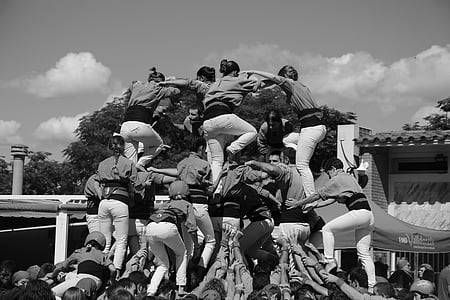 grayscale photography of group of people thumbnail