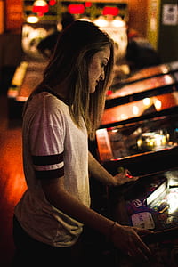 woman playing arcade thumbnail