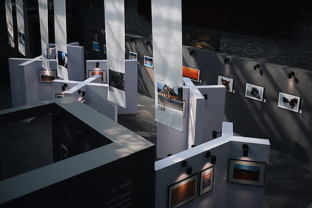 assorted paintings on walls thumbnail