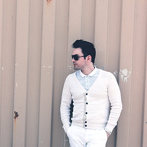 man leaning on the wall thumbnail