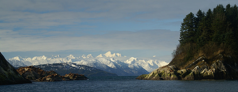 body of water near island at daytime thumbnail