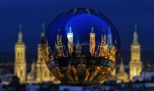selective focus photography of castle inside clear ball thumbnail