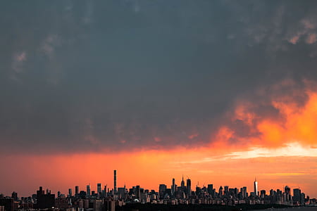 high rise building during sunset thumbnail