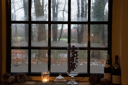 clear glass vase near window thumbnail