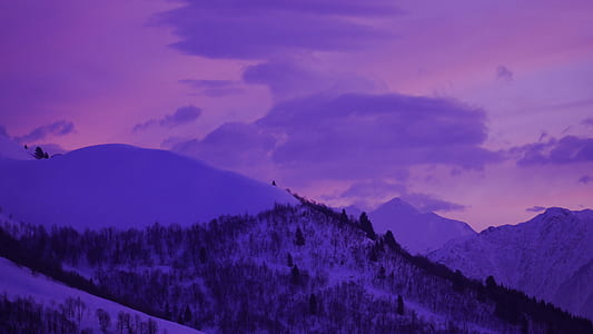 snow-covered mountains during dawn thumbnail
