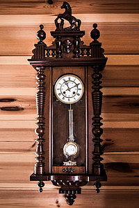 brown and white pendulum clock thumbnail