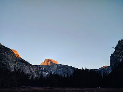 landscape photography of mountain and trees thumbnail