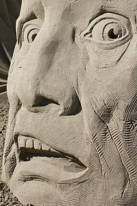 gray concrete face statue thumbnail