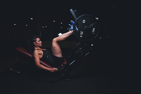 woman using black exercise gym equipment thumbnail
