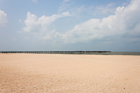 empty shore near dock during day thumbnail