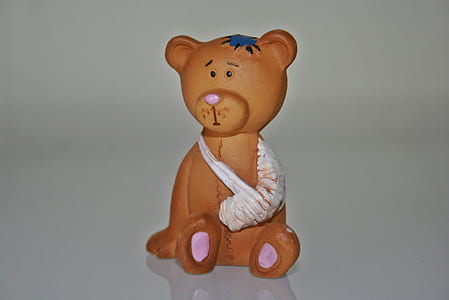 bear figurine on beige surface thumbnail