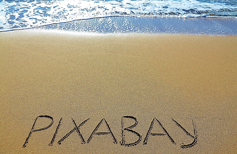 beach shore with pixabay writings on sand thumbnail