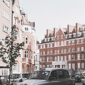 brown and white concrete building thumbnail