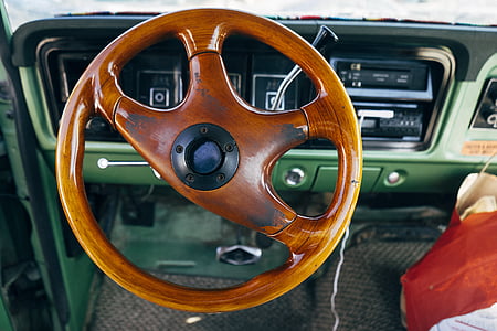 brown steering wheel inside vehicle thumbnail