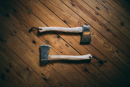 black axe on brown surface thumbnail