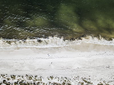 aerial photography of shoreline during daytime thumbnail