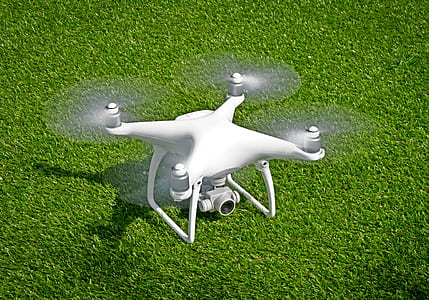 white drone quadcopter on grass thumbnail