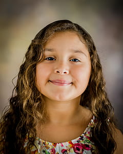 portrait photography of girl wearing floral top thumbnail