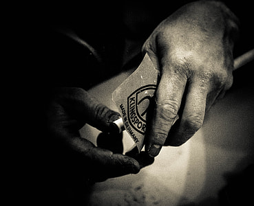 man holding paper thumbnail