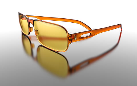 yellow sunglasses on gray surface thumbnail