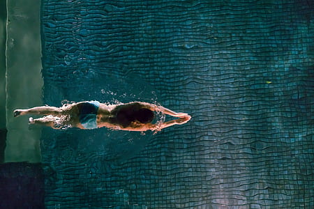 person swimming on pole thumbnail