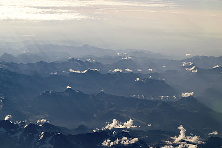birds eye view of mountain with clouds thumbnail