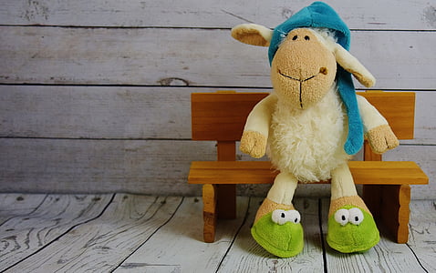 white sheep siting in bench illustration thumbnail