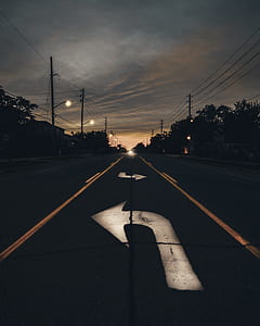 landscape photography of street road during sunset thumbnail