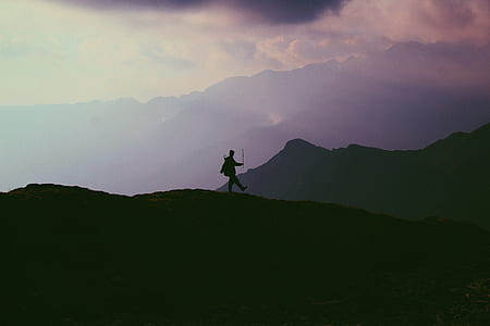 person walking on top of mountain thumbnail