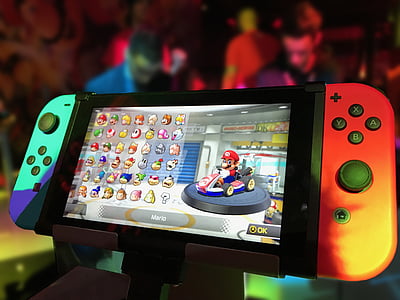 turned on Nintendo Switch with Joy-Con and Super Mario game display thumbnail