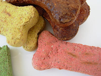 four assorted colored biscuits on white surface thumbnail