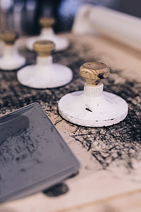 Big wooden stamps on a dirty table thumbnail