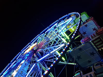 blue and green ferris wheel during night time thumbnail