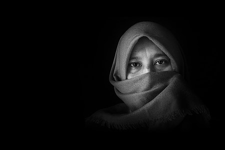 grayscale photograph of woman wearing hijab headscarf thumbnail