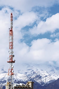 white and red antenna under cloudy day thumbnail