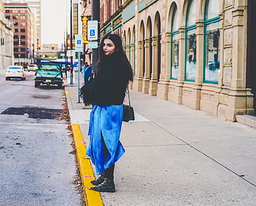 woman standing on the sidewalk thumbnail