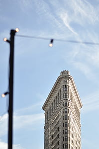 photography of white building during daytime thumbnail