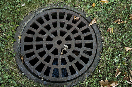round black metal manhole cover thumbnail