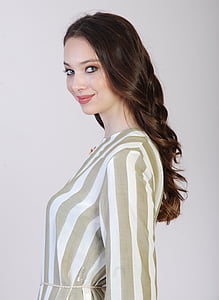 closeup photography of woman in gray and white striped top thumbnail