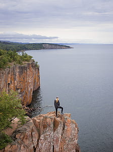 person standing on mountain thumbnail