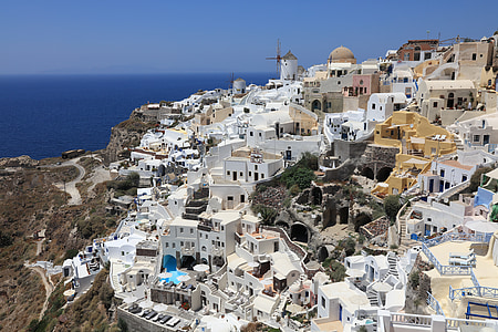 aerial photography of white and brown concrete buildings during daytime thumbnail