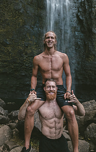 men at waterfalls thumbnail