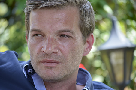man in blue polo shirt thumbnail
