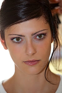 woman wearing white scoop-neck top thumbnail