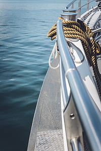 selective focus photography of rope on boat thumbnail