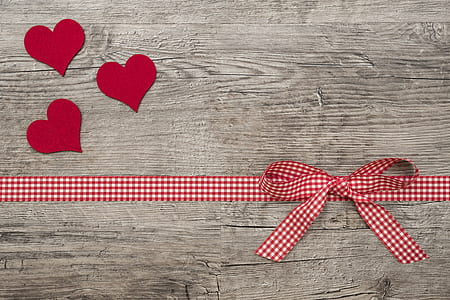 white and black gingham bow accent decor on brown surface thumbnail