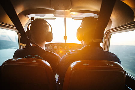 two person wearing black headsets thumbnail