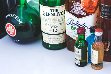 A lot of different bottles of whiskey thumbnail